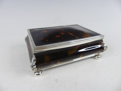 Lot 2325 - An Edwardian tortoiseshell and silver framed...