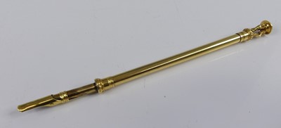 Lot 2329 - A 19th century yellow metal dip pen, unmarked...