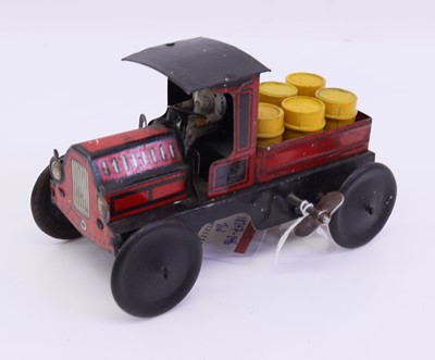 Lot 273 - Burnett tinplate and clockwork open back truck,...