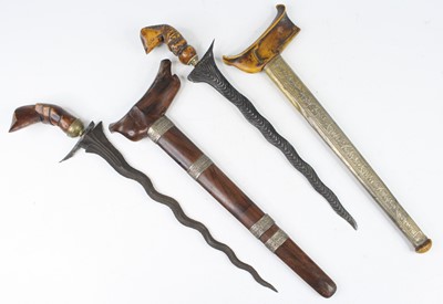 Lot 760 - An Indonesian Kris, having a 33cm wavy pamor...