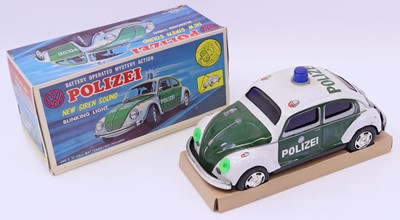 Lot 1723 - SH of Japan, tinplate and battery operated...