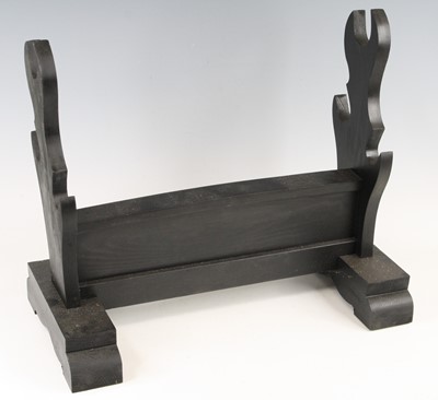 Lot 759 - A stained pine sword stand or kake, to display...