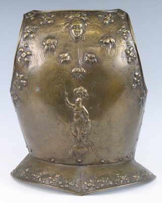 Lot 799 - A decorative cast brass breast plate, embossed...