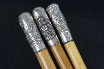 Lot 724 - A swagger stick, having a malacca shaft and...