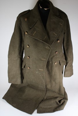 Lot 727 - A British Military issue Greatcoat, 1951...