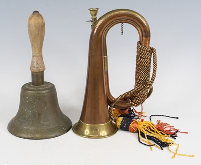 Lot 722 - An A.R.P. brass hand bell, the collar...