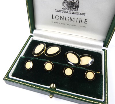 Lot 2301 - An 18ct yellow gold enamel cufflink and dress...