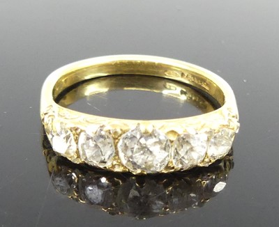 Lot 2280 - A yellow metal diamond half eternity ring...