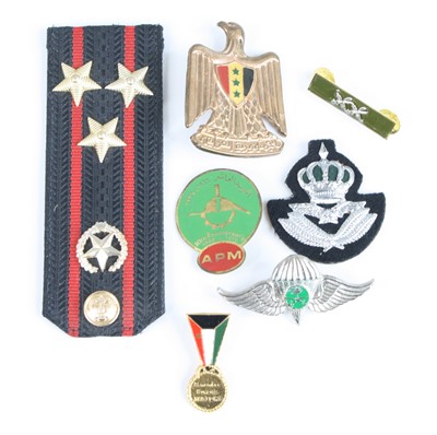 Lot 729 - A small collection of assorted military and...