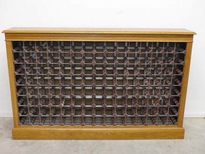 Lot 1524 - A contemporary blond oak 125 bottle capacity...