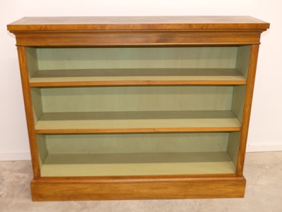 Lot 2485 - A walnut and figured walnut freestanding open...