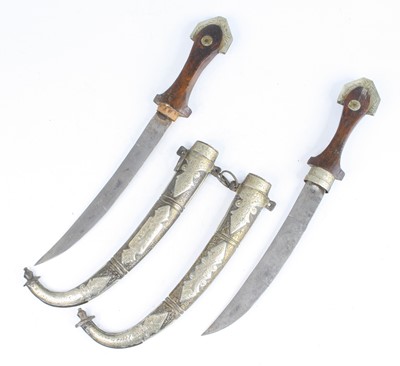 Lot 731 - A pair of Eastern daggers, each having a 20cm...