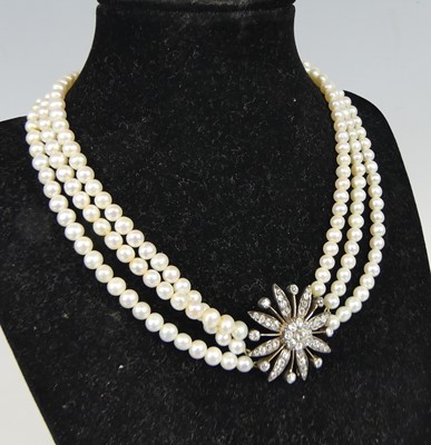 Lot 2293 - A late Victorian three row pearl and diamond...