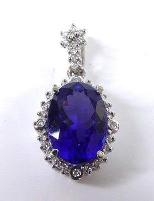 Lot 2265 - An 18ct white gold tanzanite and diamond oval...