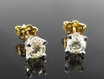 Lot 2294 - A pair of 18ct yellow and white gold diamond...
