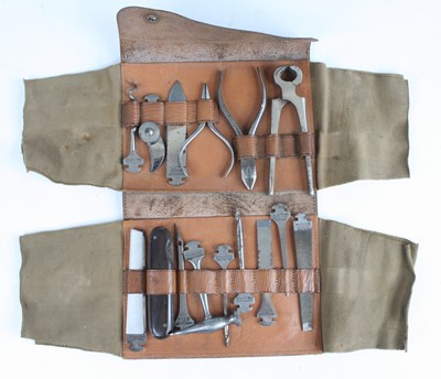 Lot 660 - An early 20th century German multi-tool set,...