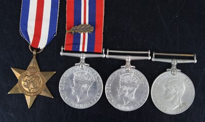 Lot 663 - A group of four WW II medals to include France...