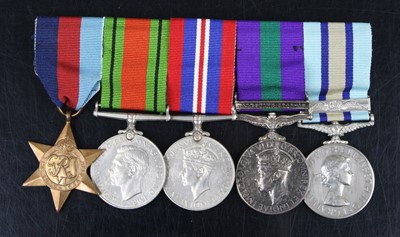 Lot 690 - A group of five medals to include WW II France...