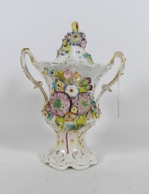 Lot 2 - A mid 19th century floral encrusted...