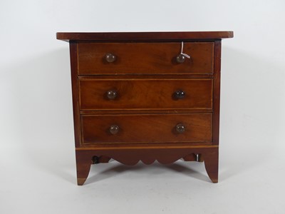 Lot 9 - A 19th century mahogany three-drawer...
