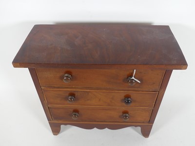 Lot 9 - A 19th century mahogany three-drawer...