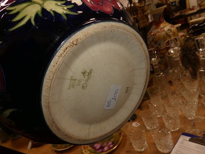 Lot 15 - A Moorcroft pottery 'Rose and Bud' pattern...