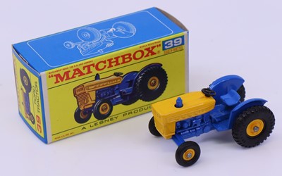 Lot 1306 - Matchbox No.39 Ford Tractor in blue body with...