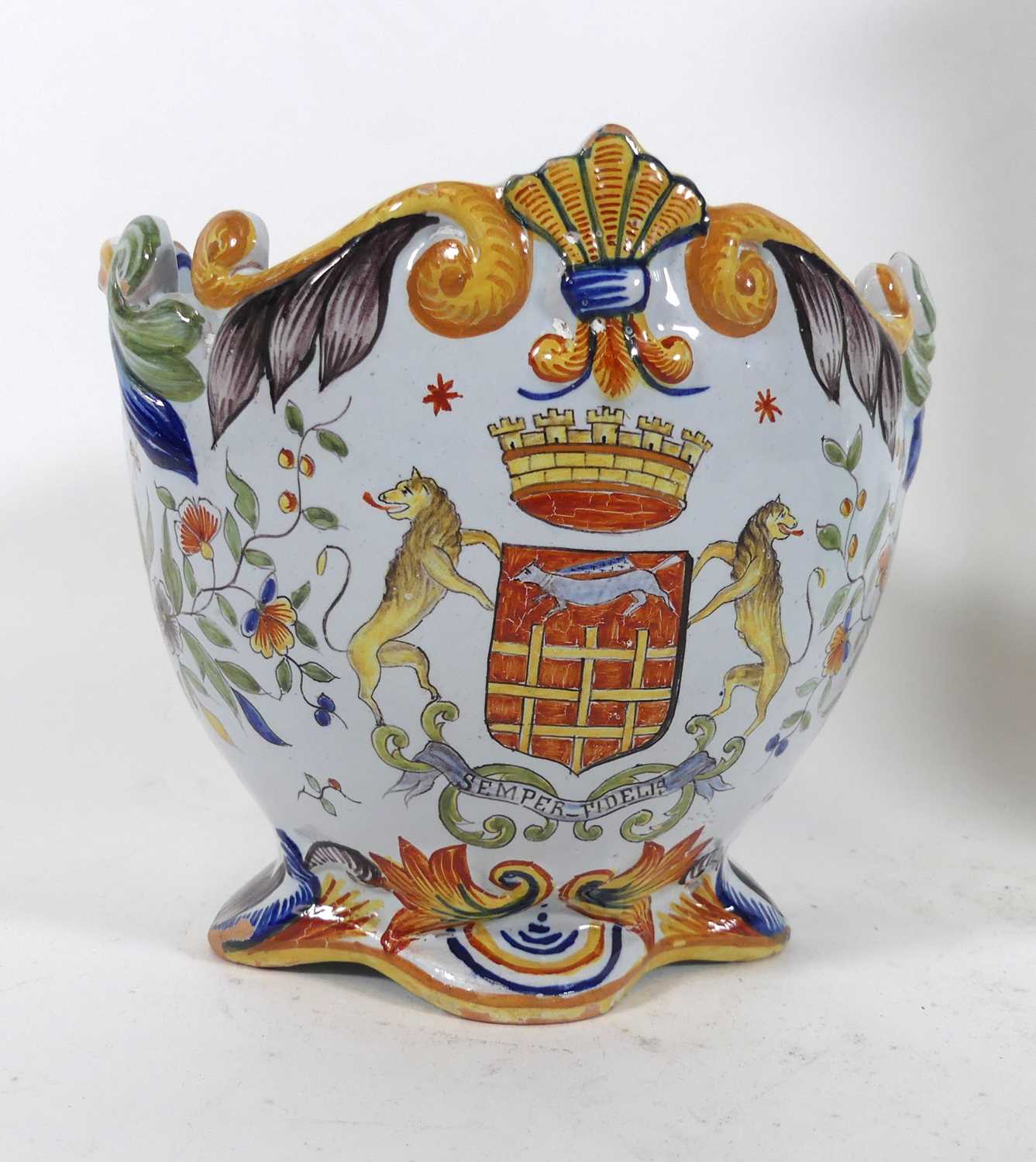 Lot 28 - An Italian majolica cache pot, polychrome...