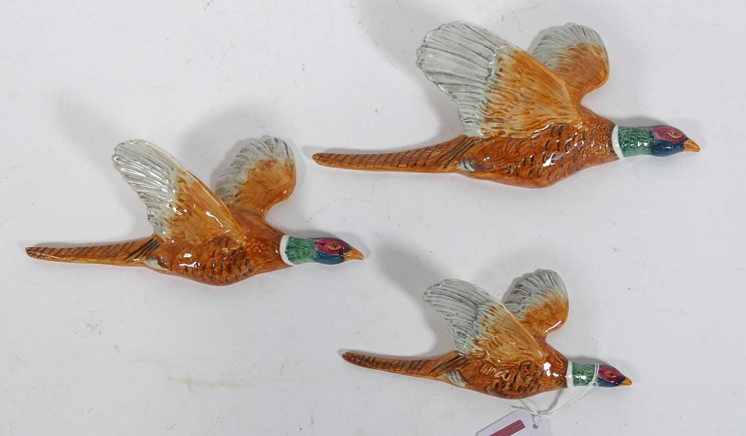Lot 49 - A graduated set of three Beswick pottery...