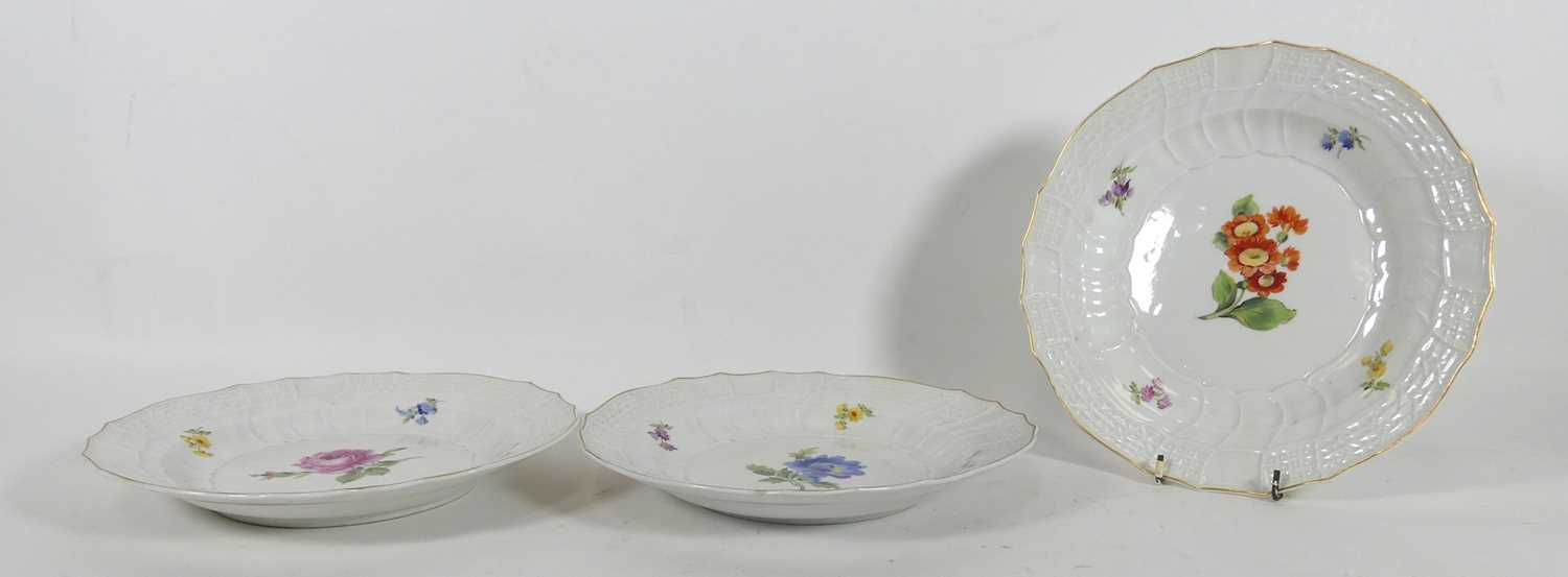 Lot 53 - A set of three Meissen porcelain plates, each...
