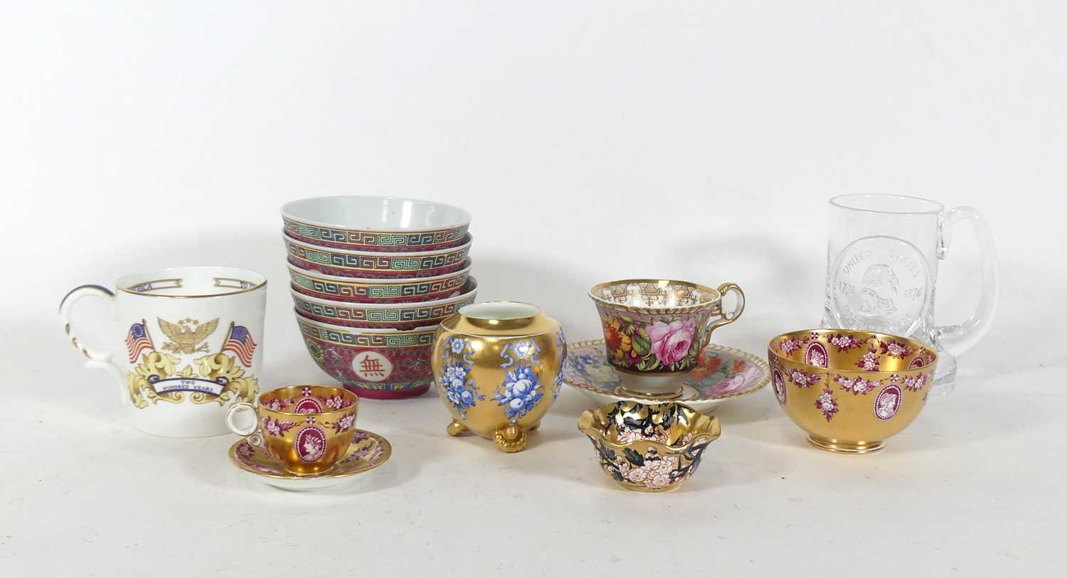 Lot 56 - A Coalport miniature cabinet cup and saucer,...