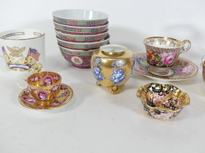 Lot 56 - A Coalport miniature cabinet cup and saucer,...