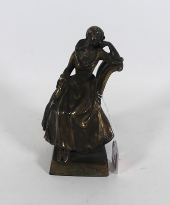 Lot 59 - A bronze figure of a lady seated in a chair, h....
