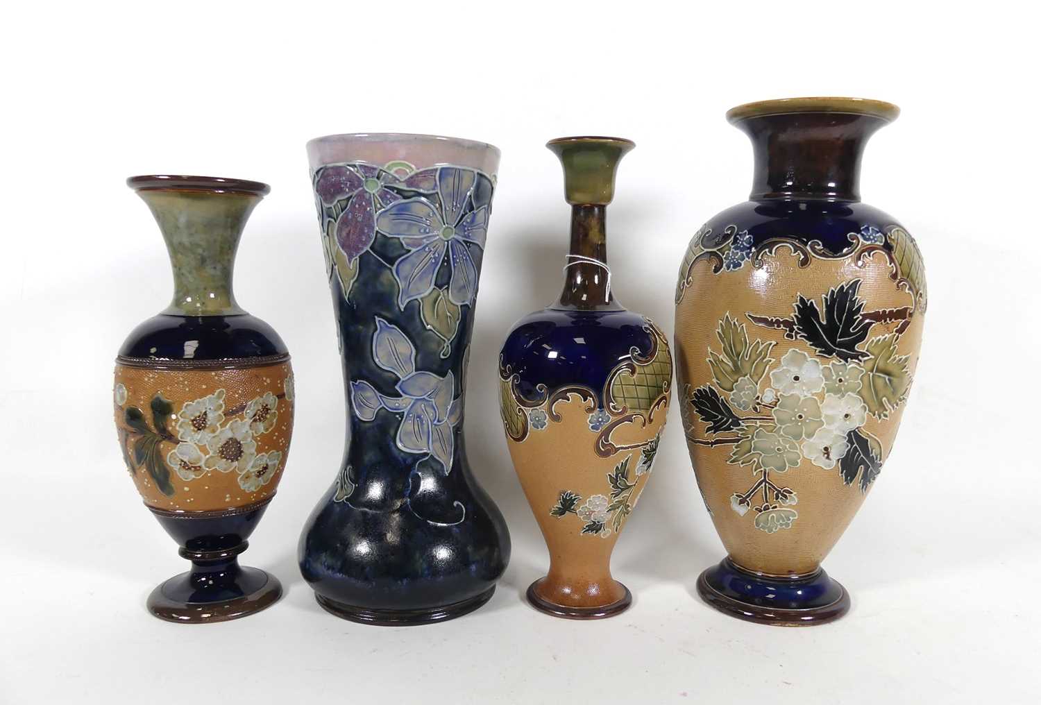 Lot 60 - A group of four Doulton vases, to include a...