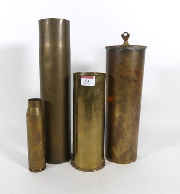 Lot 64 - A group of four brass shell cases, largest h.35cm