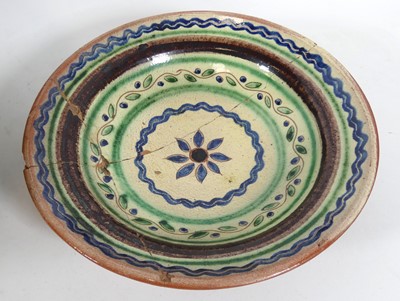 Lot 67 - A green glazed Turkish? terracotta bowl, early...
