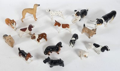 Lot 71 - A collection of Beswick figures of dogs, to...