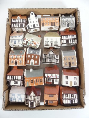 Lot 78 - A collection of Mudlen pottery cottages,...