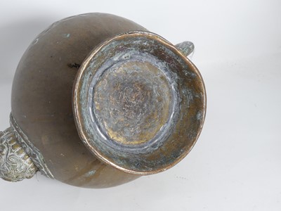 Lot 89 - A Bedouin copper water vessel, having a...