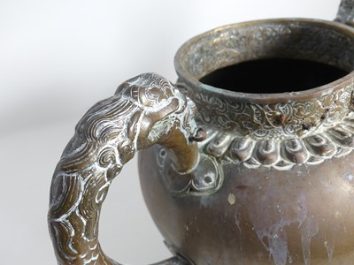 Lot 89 - A Bedouin copper water vessel, having a...