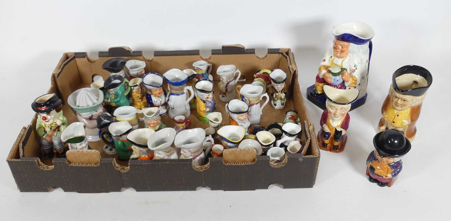Lot 91 - A collection of Toby jugs, early 20th century...