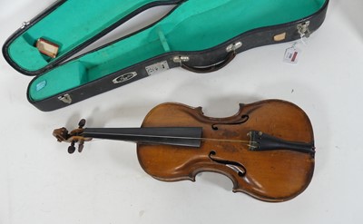 Lot 100 - A violin, having a two-piece maple back, and...