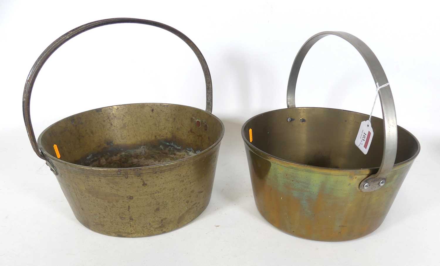Lot 103 - A 19th century brass jam pan, having a riveted...