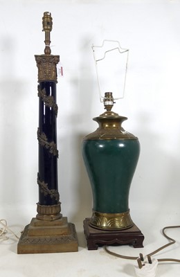 Lot 137 - A 20th century ceramic table lamp in the form...