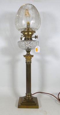 Lot 139 - A Victorian pedestal oil lamp, having an...