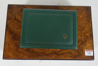 Lot 140 - A Victorian figured walnut writing slope, the...