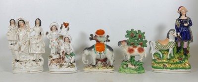 Lot 142 - A pair of 19th century Staffordshire figures,...