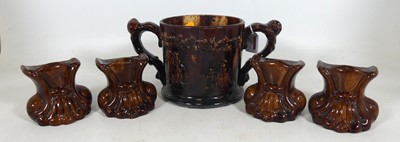 Lot 157 - A large Victorian treacle glazed loving cup,...