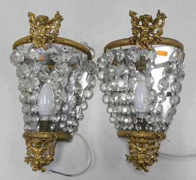 Lot 202 - A pair of gilt metal mounted mirrored wall...