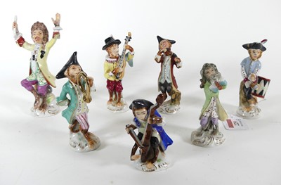 Lot 229 - A German porcelain seven piece monkey band...